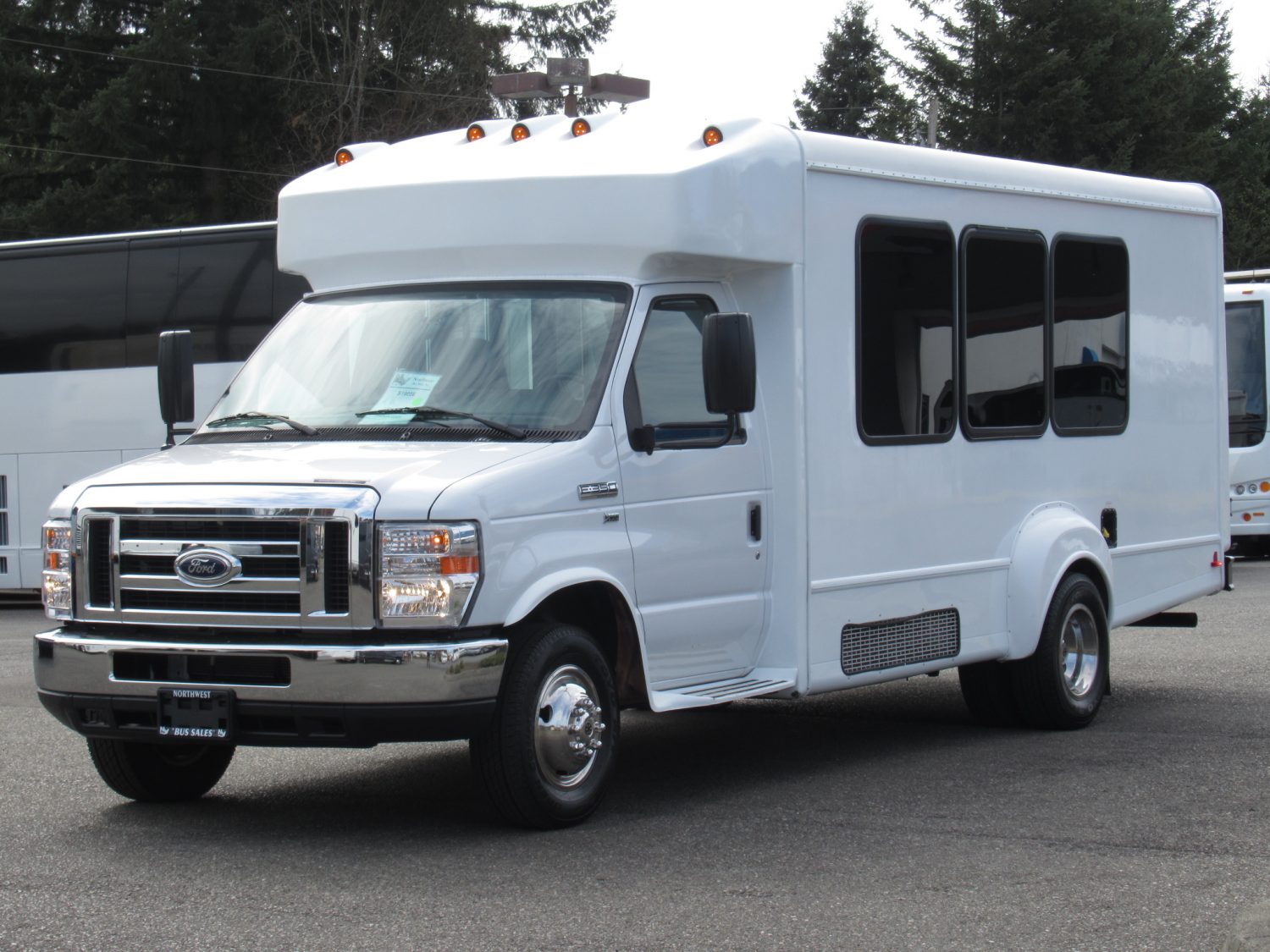 2016 Ford Goshen 14 Passenger + Rear Luggage Shuttle Bus - S19056 - Image 2