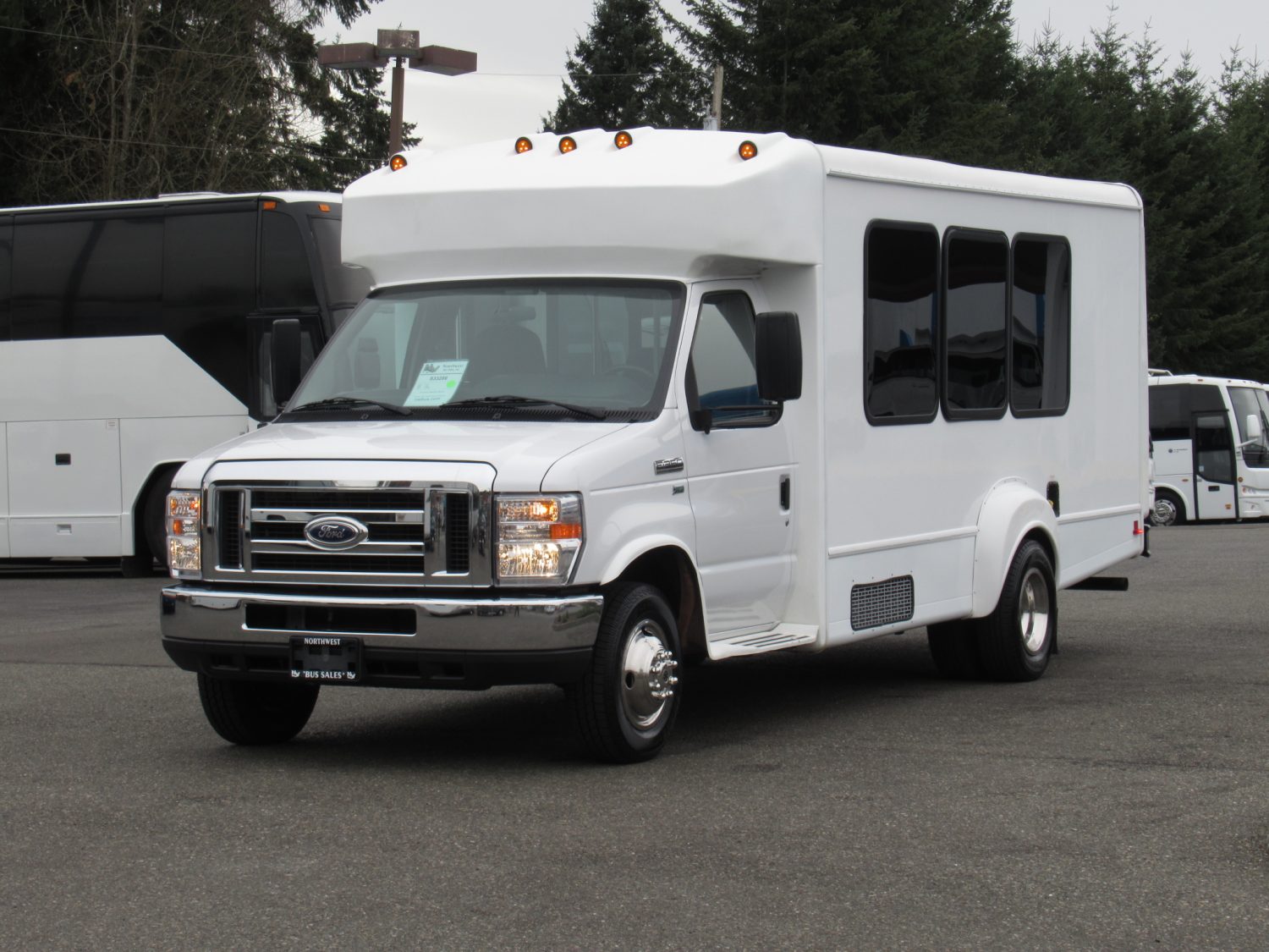 2016 Ford Goshen 14 Passenger + Rear Luggage Shuttle Bus - S33286 - Image 2