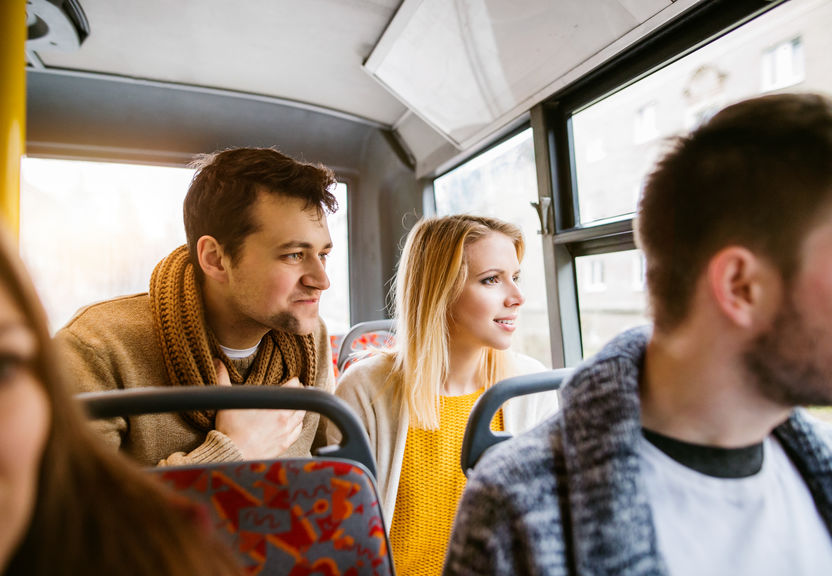 group of tourists on large tour bus